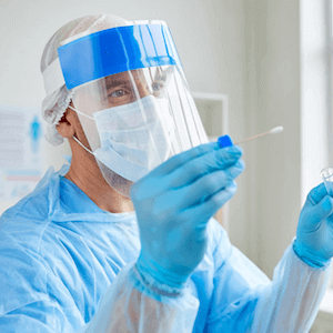 A doctor giving a PCR test